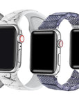 A collection of four Apple Watch bands in different colors and patterns.