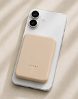 Posh Tech baby pink magnetic power bank charging iPhone wirelessly