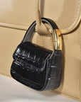 Black croc mini purse AirPods case clipped closed, back view