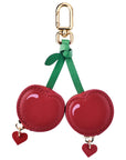 Posh Tech Cherry leather bag charm for AirTag with glossy red cherries and gold clasp