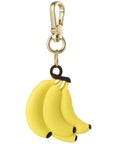 Posh Tech yellow silicone banana-bunch bag charm for AirTag with playful fruit design