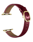 Cherry Lacquer patent leather Apple Watch band, unclasped flat-lay view showing adjustable strap