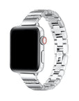 Silver rhinestone stainless steel Apple Watch® band fastened on the watch case, front view