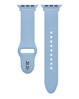 Ice blue silicone Apple Watch® band close-up, detail view of molded texture and pin closure holes
