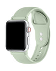 Sage green silicone Apple Watch® band fastened on the watch case, front view