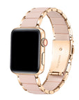 Rose gold and pink silicone Apple Watch band angled view on watch
