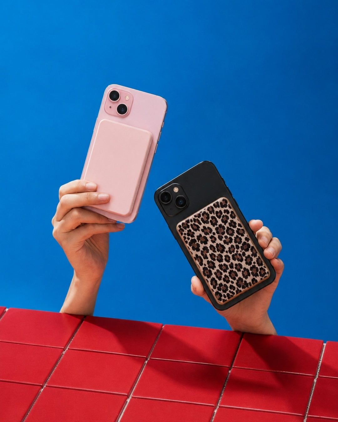 Posh Tech magnetic power banks in pink and leopard print on iPhones