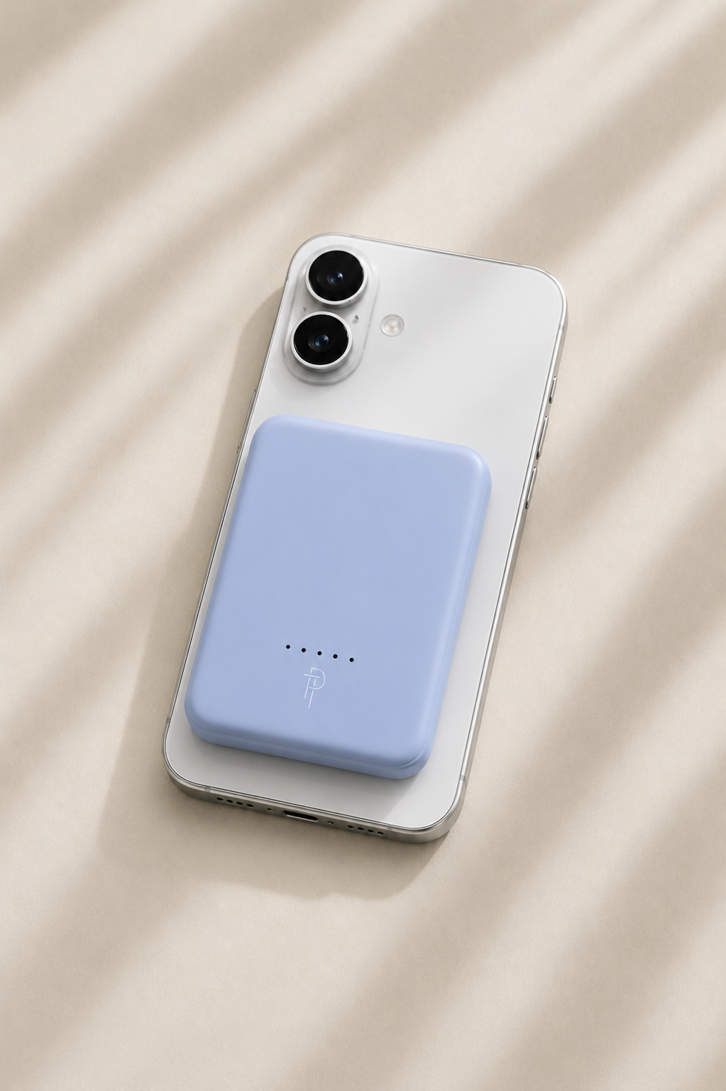 Ice blue ultra slim magnetic power bank charging iPhone wirelessly
