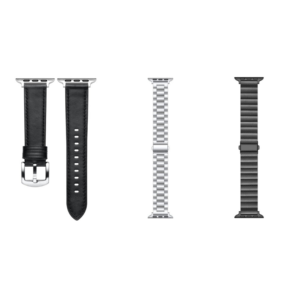 Apple Watch Band Styles Flat Lay - Black Leather, Black Silicone Sport Band, and Stainless Steel Link Bands