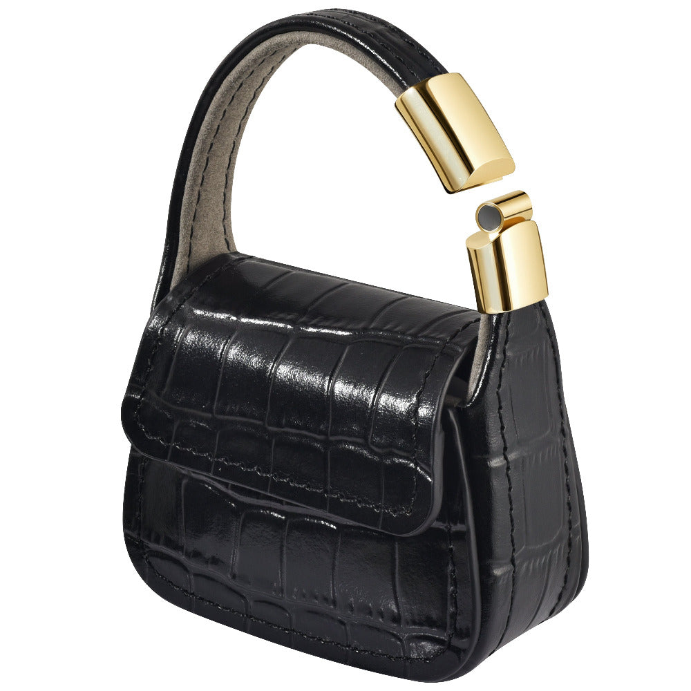 Black croc embossed AirPods case purse, closed, angled view