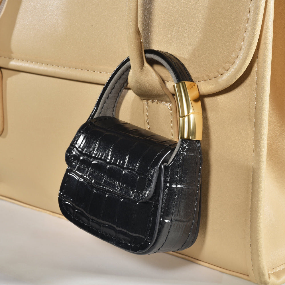 Black croc mini purse AirPods case clipped closed, back view