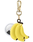 Posh Tech yellow Banana silicone AirTag bag charm shown with AirTag inserted, banana-bunch design