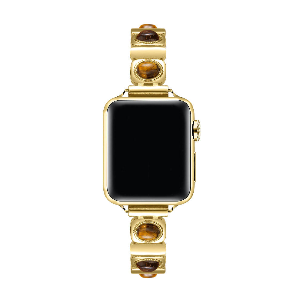 Posh Tech Gaia gold-tone chain-link Apple Watch band on Apple Watch, side angle