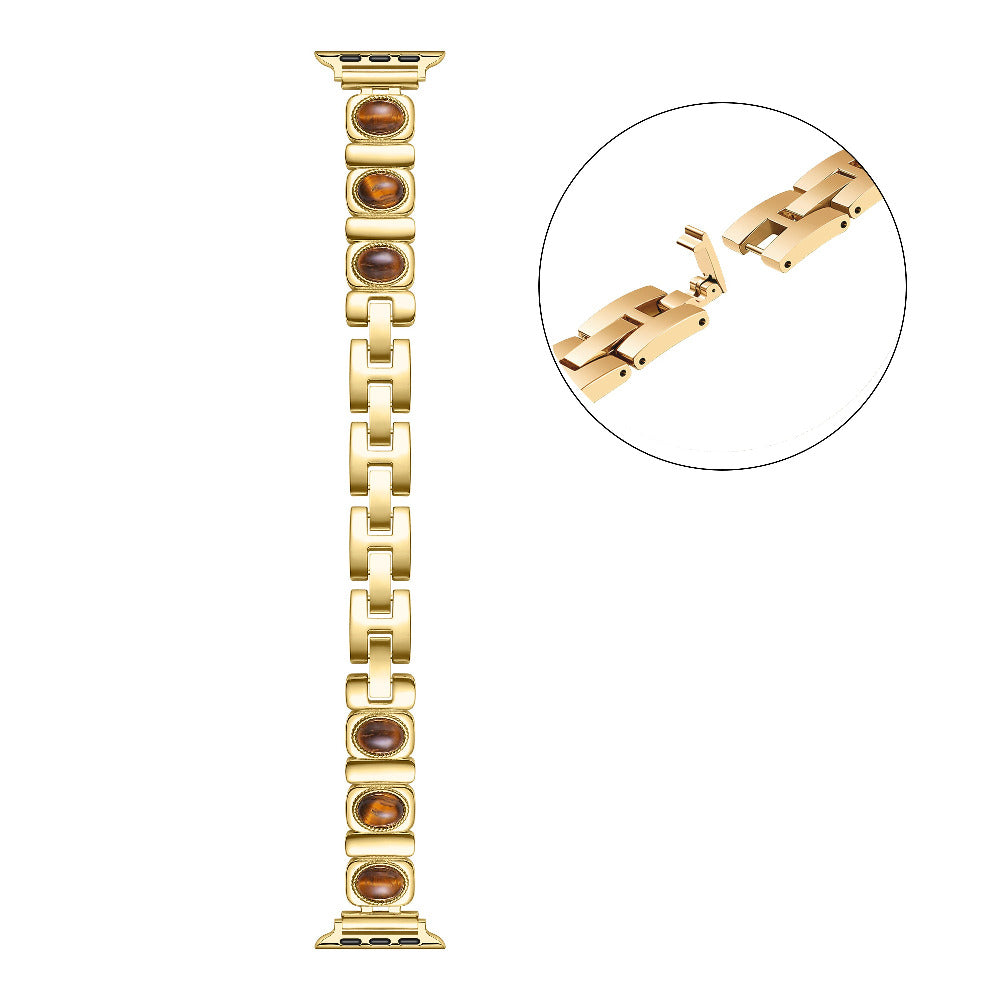 Posh Tech Gaia gold-tone chain-link Apple Watch band, coiled full-length view