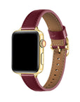 Carmen Patent Leather Band for Apple Watch in Cherry Lacquer, worn on watch showing glossy finish and gold hardware