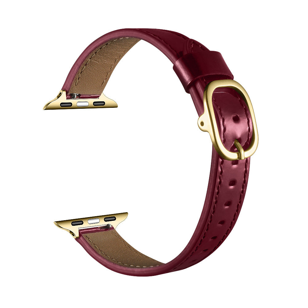Cherry Lacquer patent leather Apple Watch band, unclasped flat-lay view showing adjustable strap