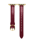 Cherry Lacquer patent leather Apple Watch band laid flat, showing stitching and adjustable holes