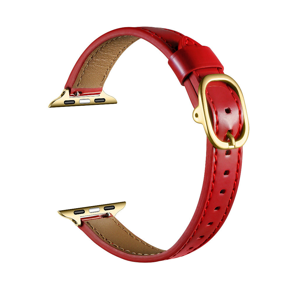 Crimson patent leather Apple Watch band, unclasped flat-lay view showing adjustable strap