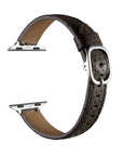 Chocolate perforated leather Apple Watch band, unclasped flat-lay view showing adjustable strap