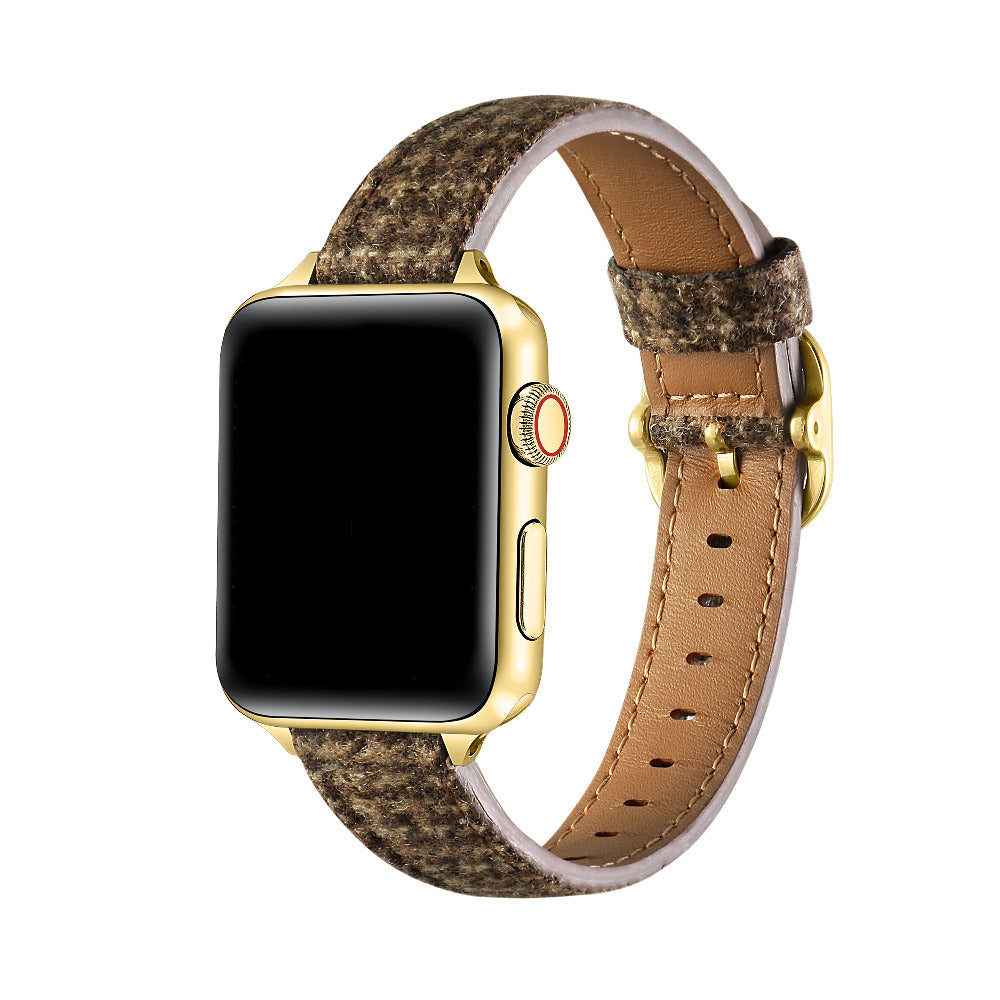 Carmen Tartan Apple Watch band in Caramel, worn on wrist with gold hardware