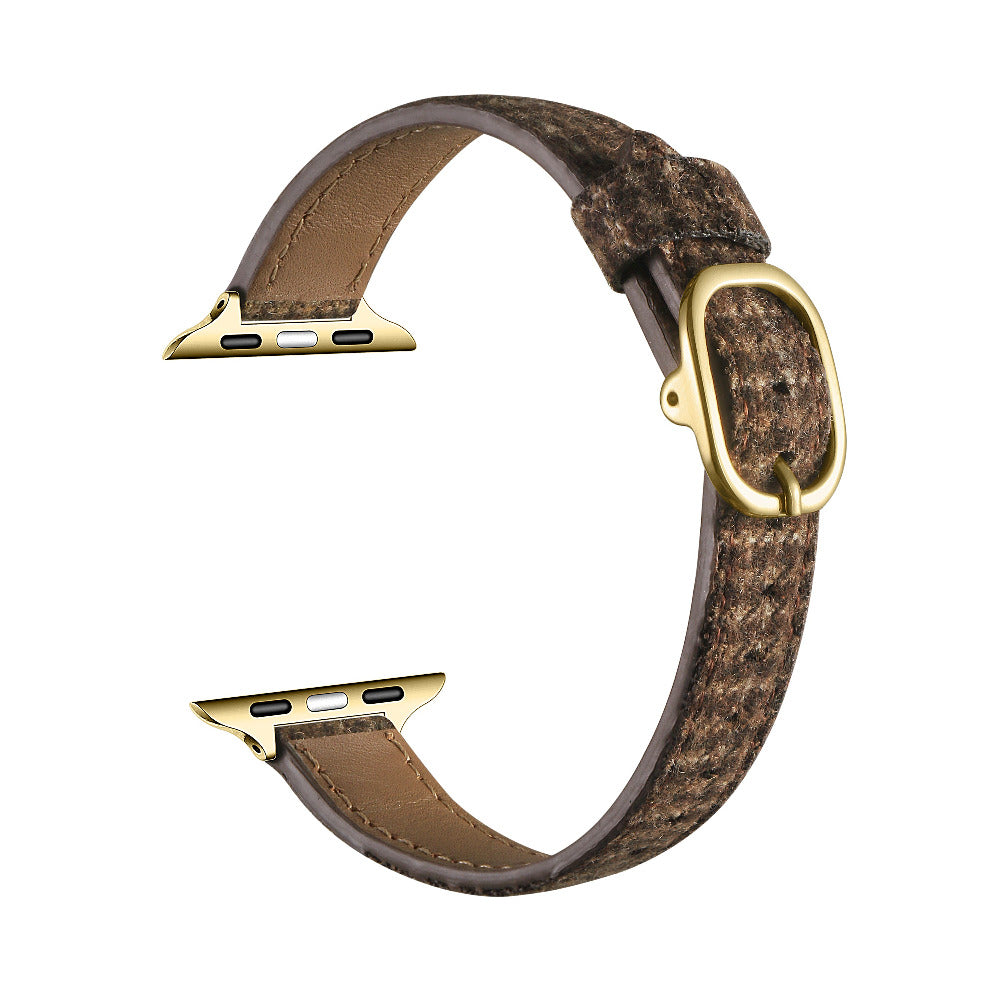 Carmen Tartan Apple Watch band in Caramel, unclasped and laid flat in a loop