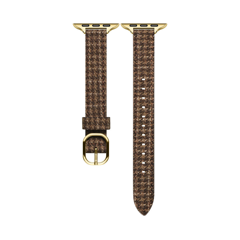 Close-up of Carmen Tartan Apple Watch band in Caramel showing tartan print and stitching
