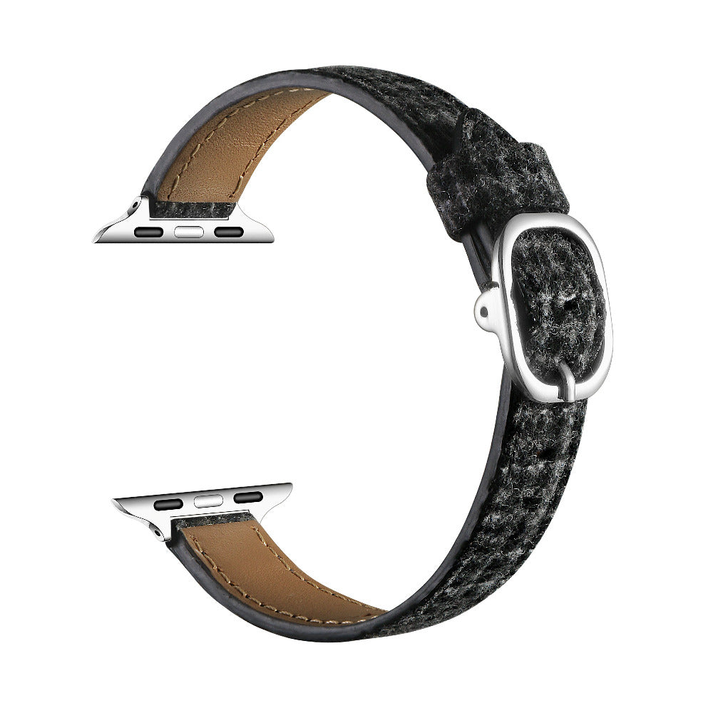 Carmen Tartan Apple Watch band in Midnight, unclasped and laid flat in a loop