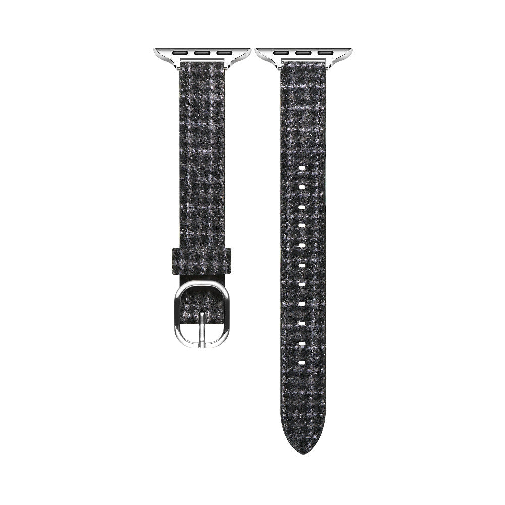 Close-up of Carmen Tartan Apple Watch band in Midnight showing tartan print and stitching