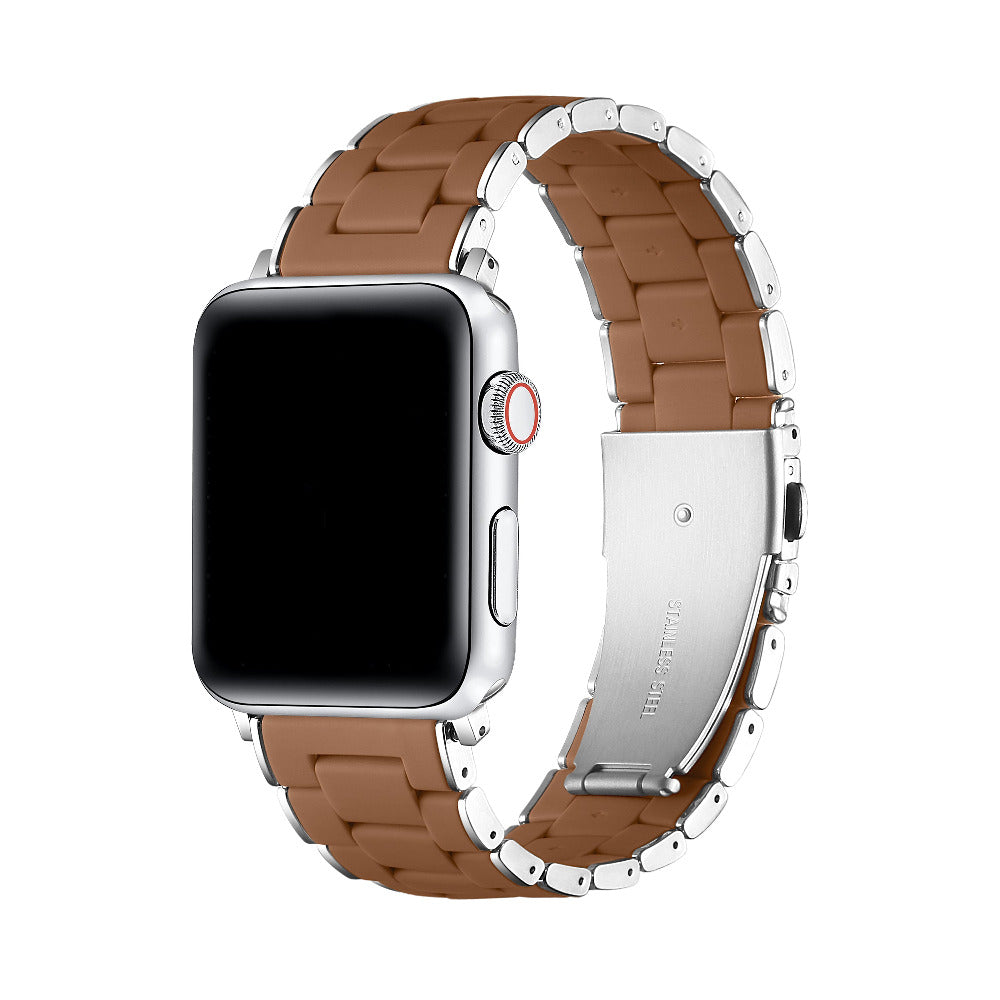A silver stainless steel smartwatch band with a brown leather inner lining, shown attached to a silver smartwatch on a clean white background.