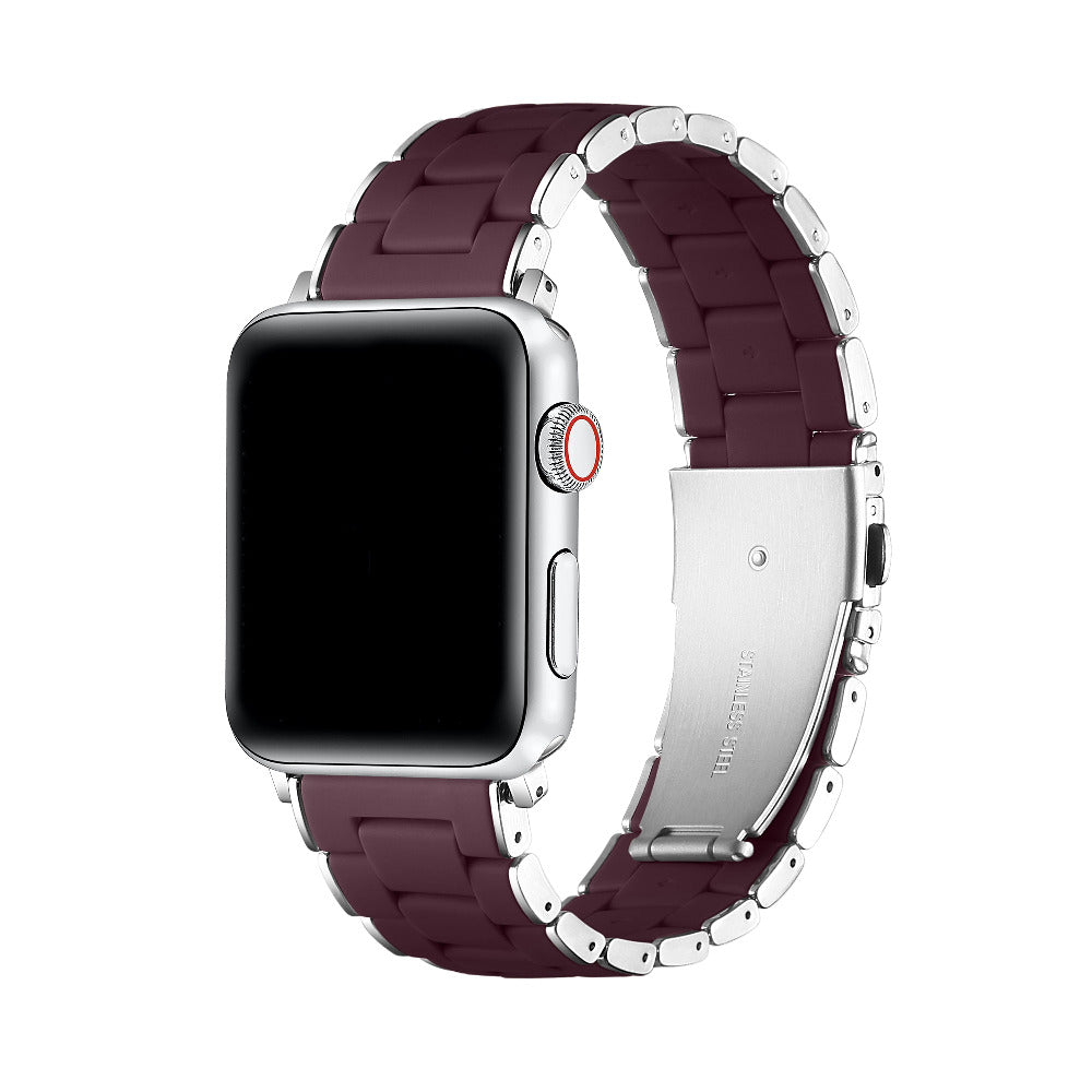 A silver smartwatch with a dark burgundy silicone link band, shown on a clean white background.