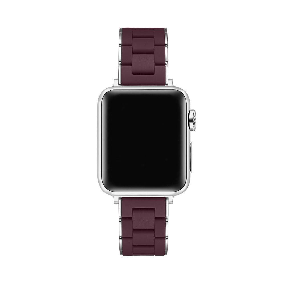 A silver smartwatch with a dark burgundy silicone link band, shown against a solid white background.