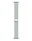 A mint green metallic link watch band with a silver buckle, shown vertically against a plain white background.
