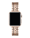 Rose gold rhinestone Apple Watch band front-facing on watch face