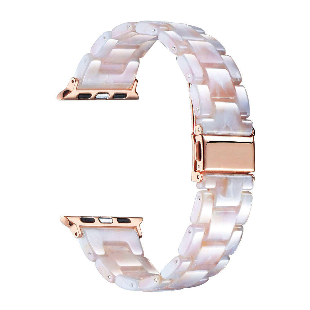 Blush pink and white tortoise shell patterned Apple Watch® band closure view 