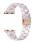 Blush pink and white tortoise shell patterned Apple Watch® band closure view 