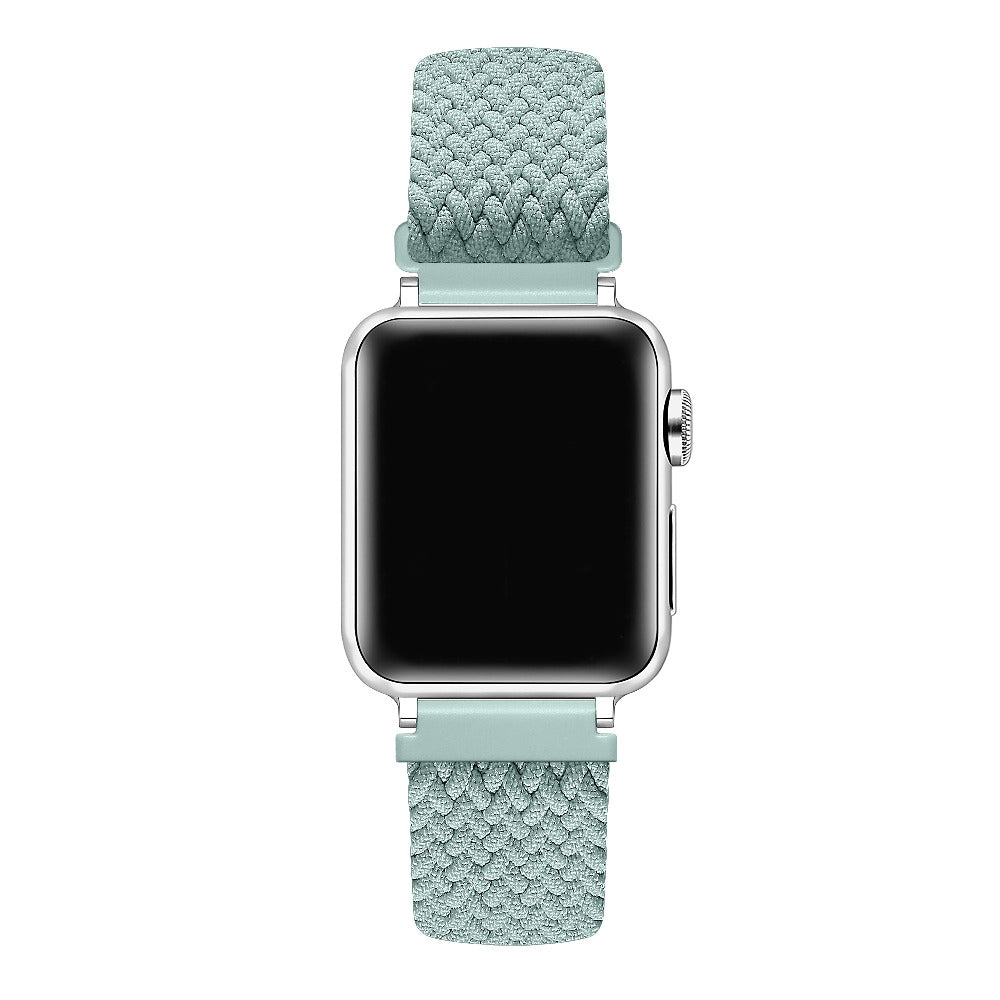 Sage Green nylon loop Apple Watch band on watch face, front view