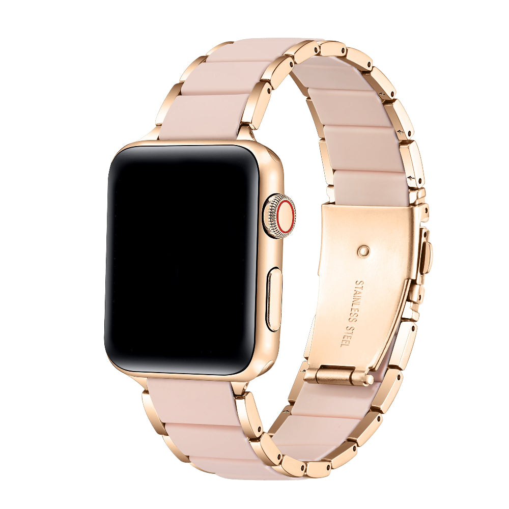 Rose gold and pink silicone Apple Watch band angled view on watch