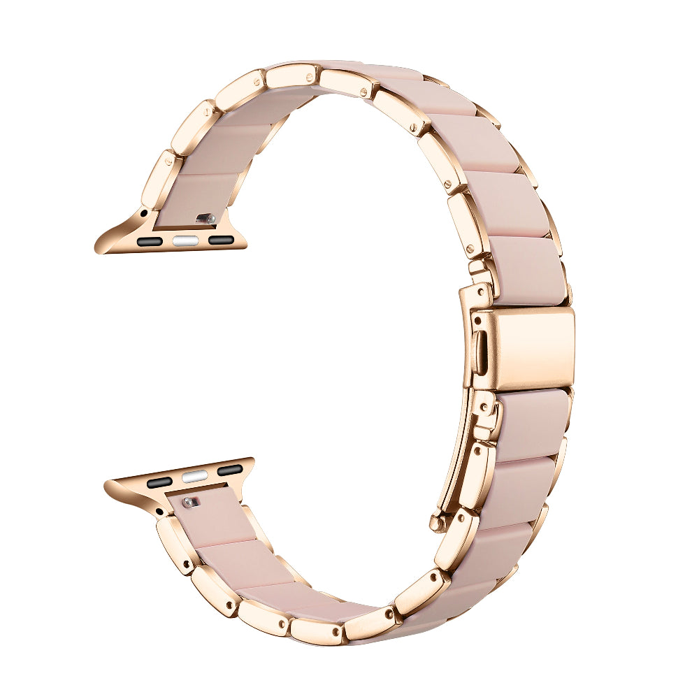 Rose gold and pink silicone Apple Watch band floating link layout