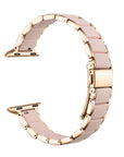 Rose gold and pink silicone Apple Watch band floating link layout