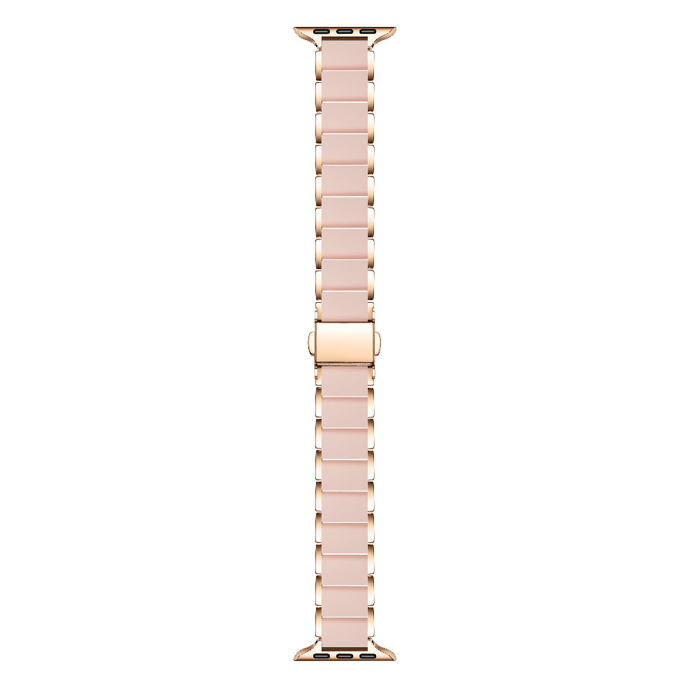 Rose gold stainless steel and pink silicone Apple Watch band flat layout