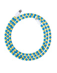 Blue and yellow USB-C beaded charging cable coiled on lavender background
