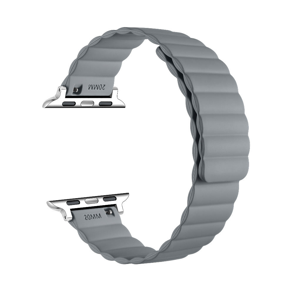 A light gray silicone watch band with a wavy, pleated design and silver metal connectors, shown on a plain white background.