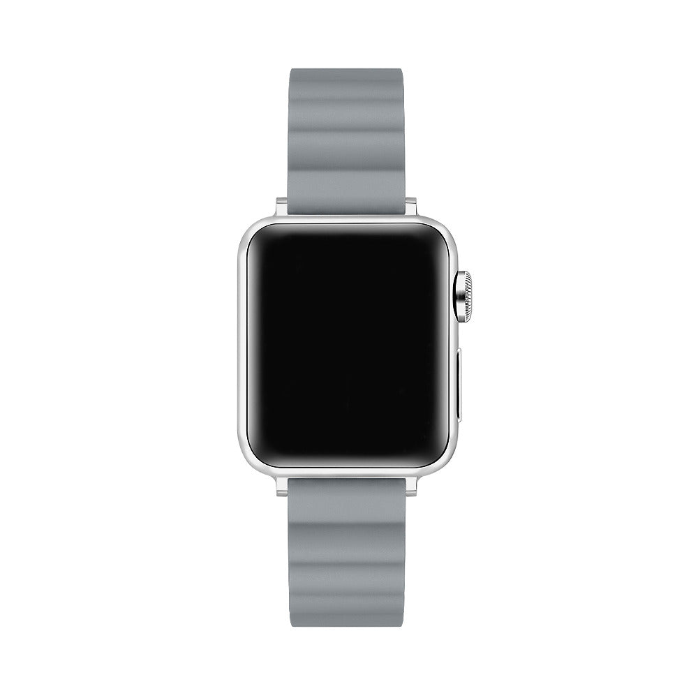 A silver smartwatch with a rectangular black screen and a light gray silicone strap, shown against a plain white background.