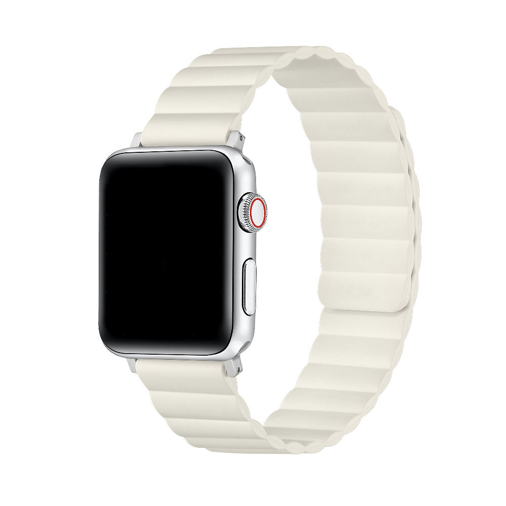 A smartwatch with a black screen and an ivory segmented silicone band, shown on a plain white background.