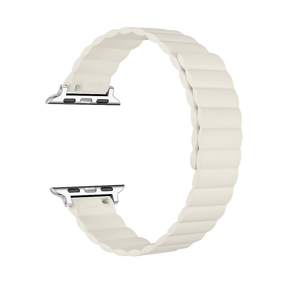 An ivory silicone watch band with a wavy, scalloped edge and a silver metal connector, shown on a plain white background.