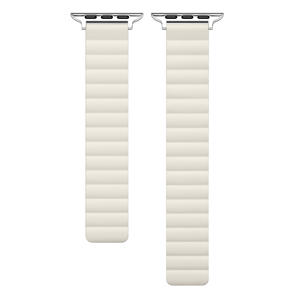 Two ivory sport band straps with silver metal hardware, displayed side-by-side on a plain white background.