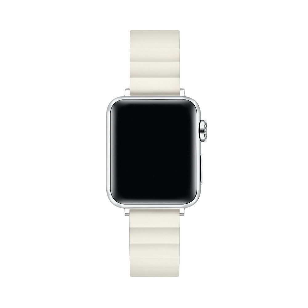 A silver smartwatch with a rectangular black screen and an ivory-colored silicone strap, shown against a plain white background.