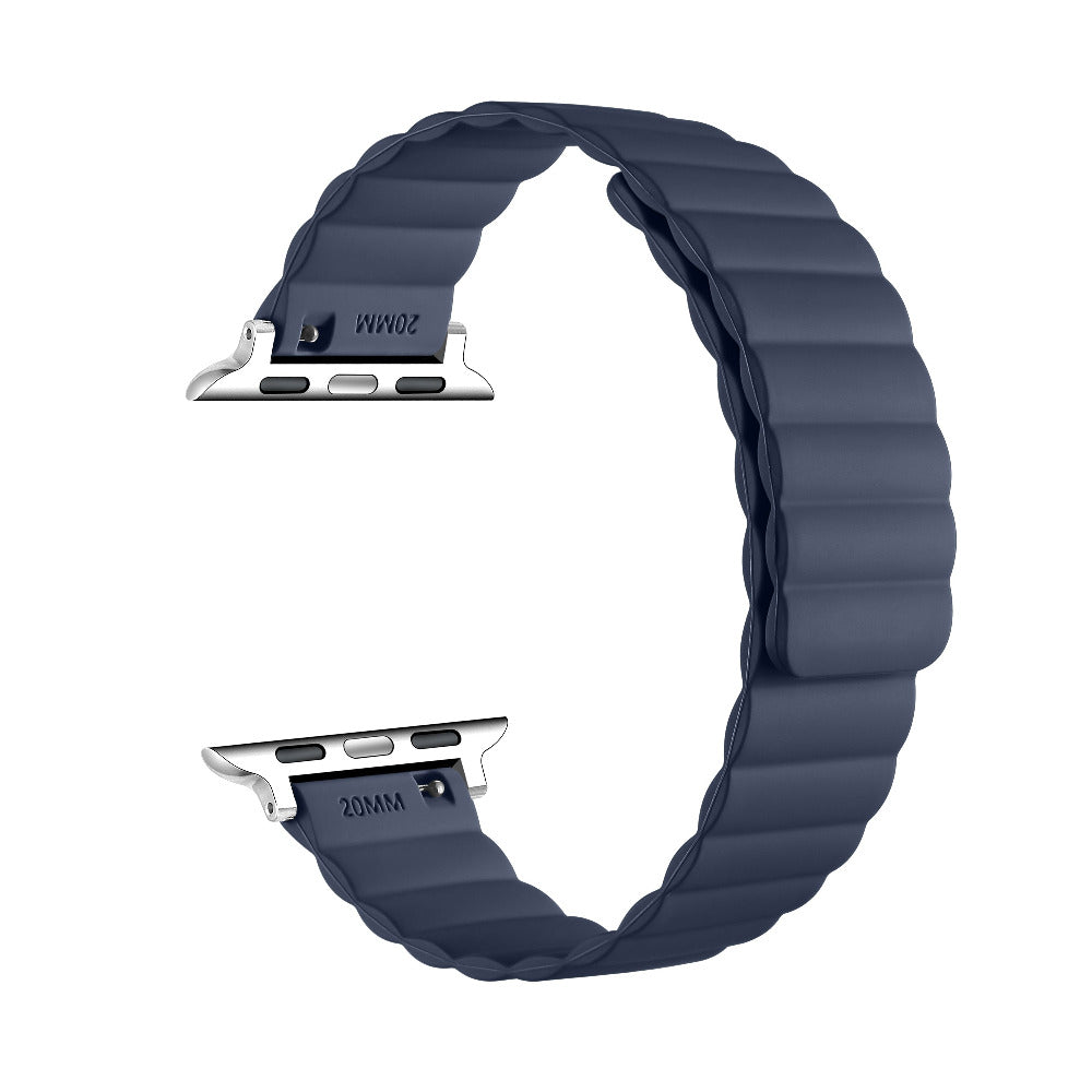 A dark navy blue silicone watch band with a textured, wavy segmented design and silver metal connectors, shown on a plain white background.