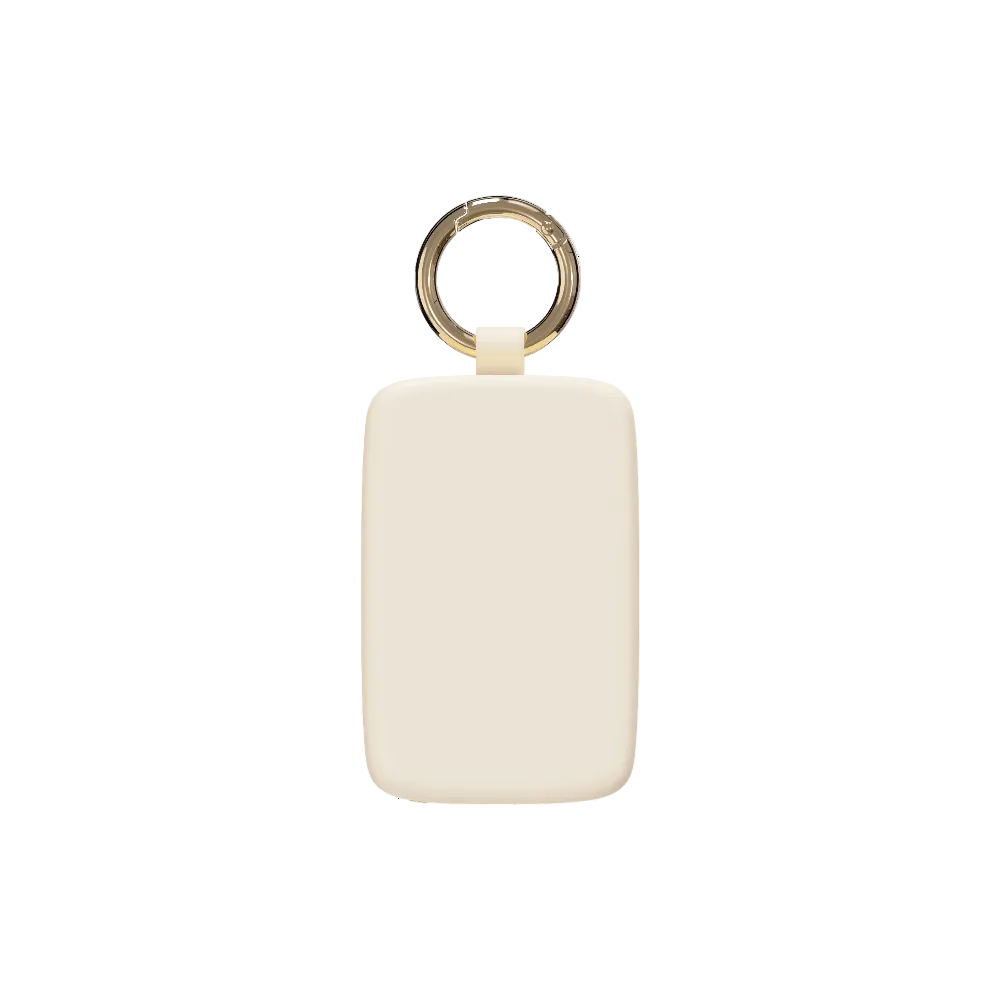 Ivory Keychain Power Bank with gold-tone key ring, front view on white background