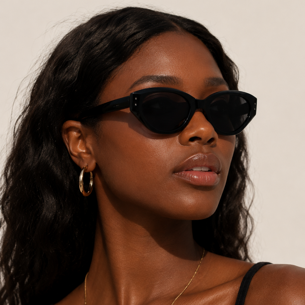 Woman wearing Josie Cateye Smart Sunglasses in black with a cateye frame